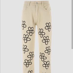 Cider flowers printed white jeans.